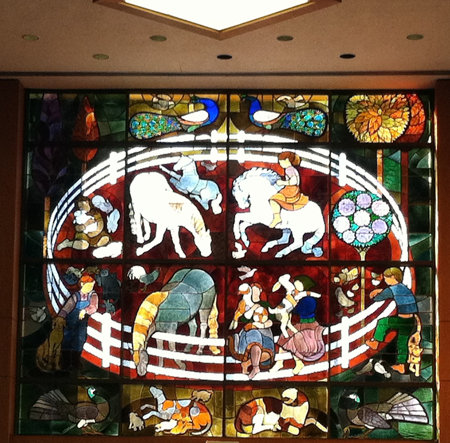 Sue Hertel and John Wallis and Associates, stained glass for Rolling Hills, 1974. Photo by Adam Arenson, 2012.